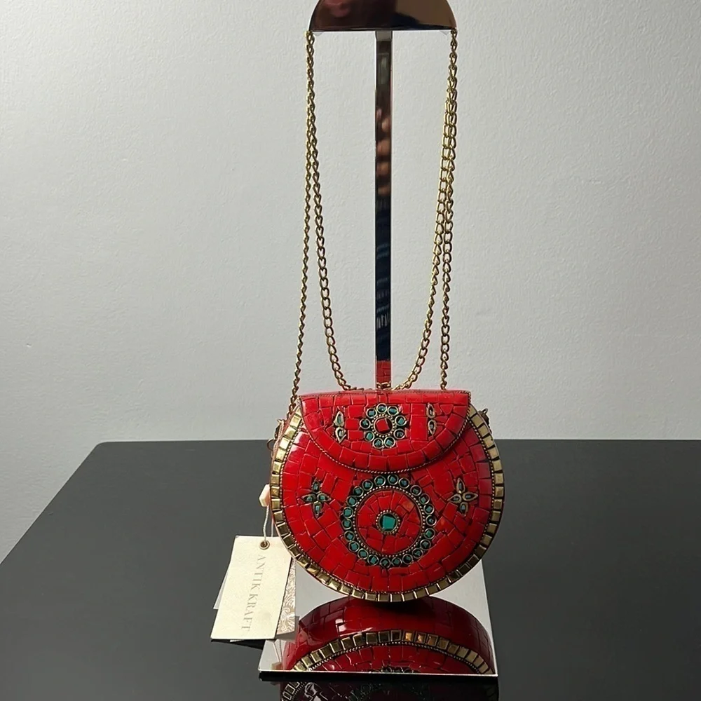 Antik Kraft small metal clutch